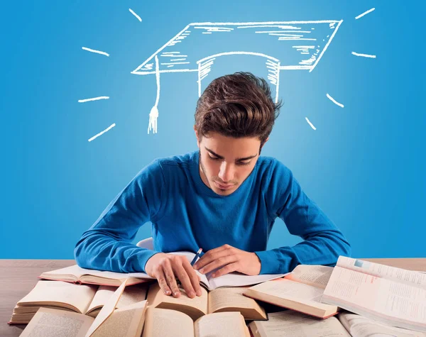 Student thinks about his graduation during the study — Stock Photo, Image