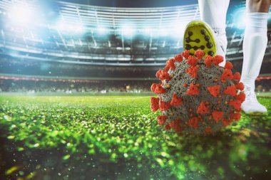 Stadyumdaki futbol ayakkabısının altında virüs topu olan futbolcu.