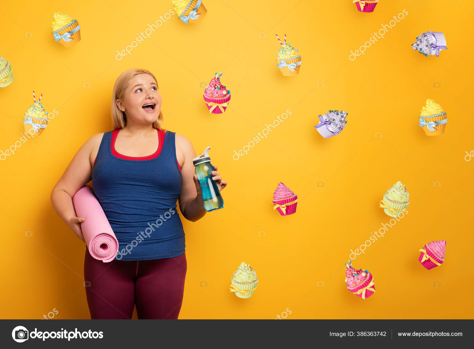 Fat girl thinks to eat sweets instead of do gym. yellow background Stock  Photo by ©alphaspirit 386363742