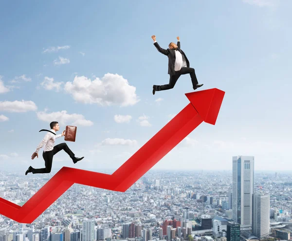 Businessmen run to reach the best results over a growing red statistic arrow. Concept of success — Stock Photo, Image