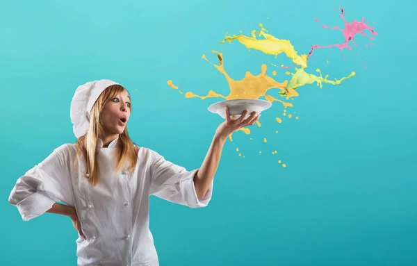 Happy chef cooks a new sweet creative recipe — Stock Photo, Image