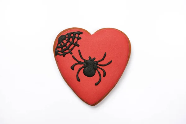 The hand-made eatable gingerbread heart with spider on white background — Stock Photo, Image