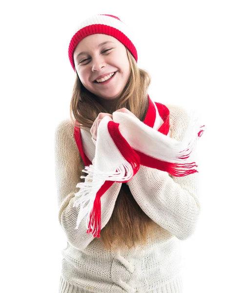 Boldogság téli ünnepek karácsony. Tinédzser koncepció - mosolygó fiatal nő, piros kalap, kendő és újra fehér háttér. — Stock Fotó