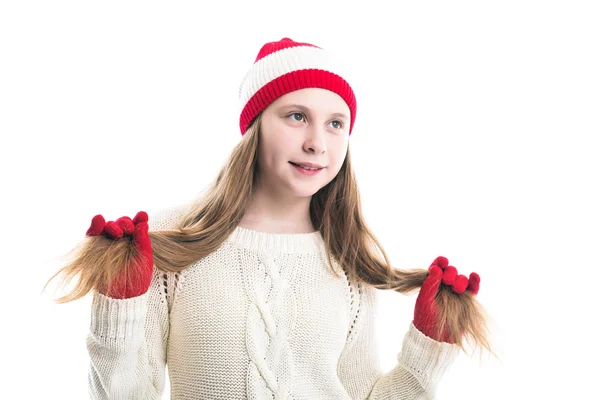 Happiness winter holidays christmas. Teenager concept - smiling young woman in red hat, scarf and over white background. — Stock Photo, Image