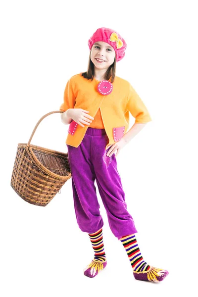 Cheerful little girl with a basket in hand in the fairy tale Little Red Riding Hood on a white background. — Stock Photo, Image