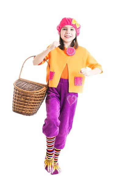 Cheerful little girl with a basket in hand in the fairy tale Little Red Riding Hood on a white background. — Stock Photo, Image