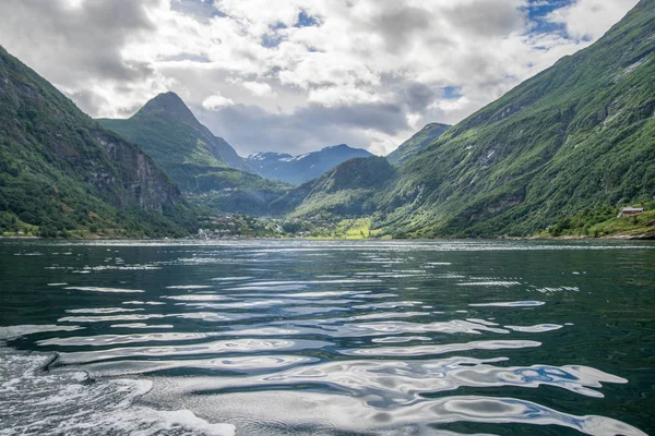 Travel in Norway fjord nature near mountain and water