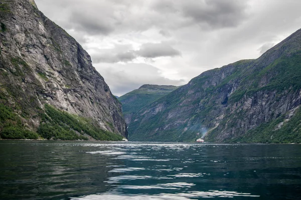 Travel in Norway fjord nature near mountain and water