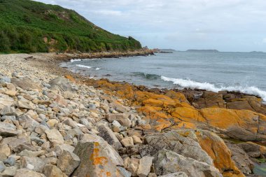 Britanya 'da gül granit deniz kıyısı gezisi ve yürüyüş