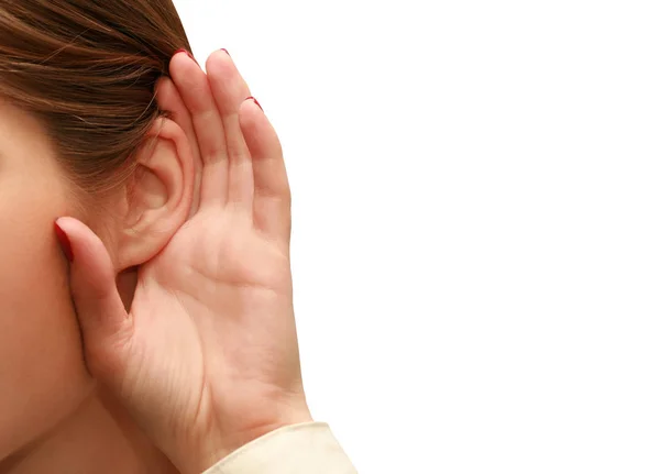 Vrouw Luistert Naar Roddels Een Witte Achtergrond — Stockfoto