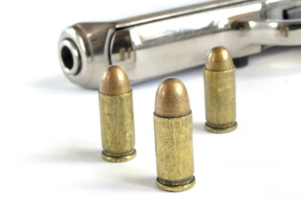 Pistol and ammunition Stock Image