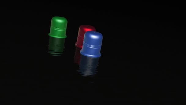 Three Color Thimbles Black Backgrounds Metaphor — Stock Video