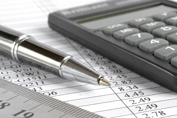 Table, ruler and calculator — Stock Photo, Image