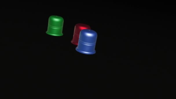 Three Color Thimbles Black Backgrounds Metaphor — Stock Video