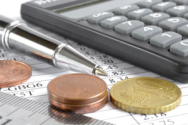 Table and coins — Stock Photo, Image