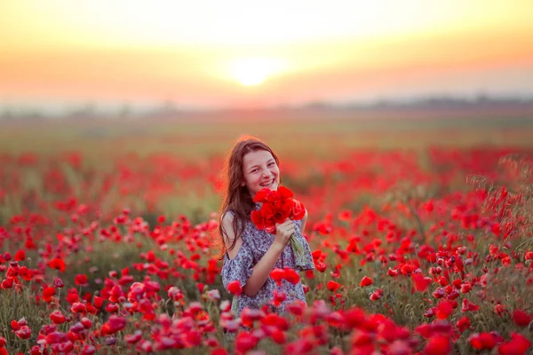 Young Girl Poppies Bouquet Hand Looking Viewer Stock Photo