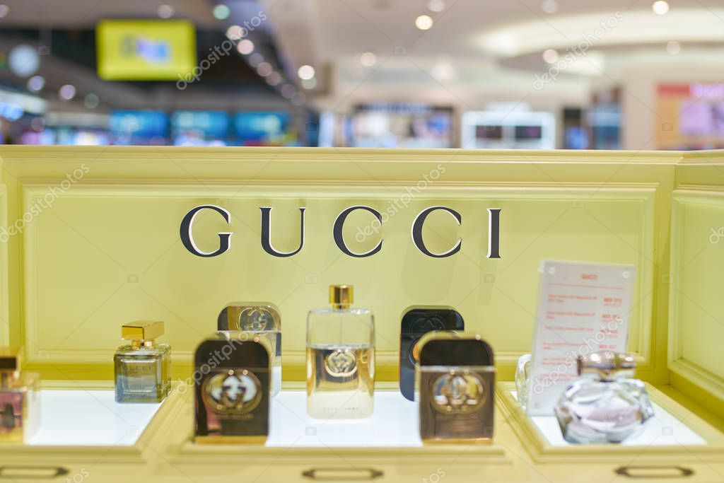DUBAI, UAE - CIRCA FEBRUARY, 2019: close up shot of Gucci perfume bottles in Duty Free at Dubai International Airport.
