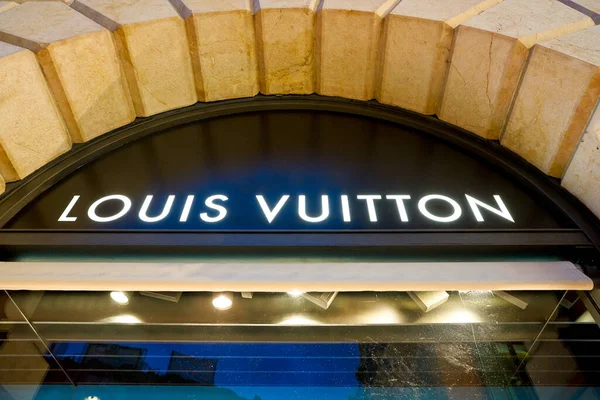 KUALA LUMPUR, MALAYSIA - APRIL 23, 2014: Louis Vuitton Shop Window In Suria  KLCC Shopping Mall. Louis Vuitton Or Shortened To LV, Is A French Fashion  House Founded In 1854 By Louis