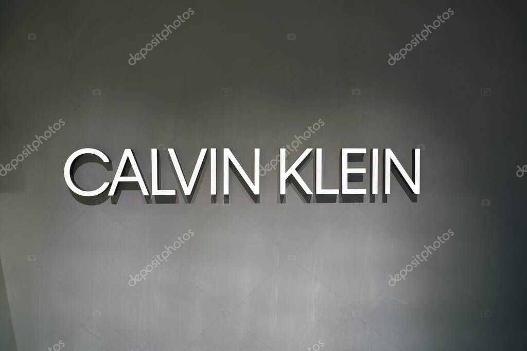 DUSSELDORF, GERMANY - CIRCA SEPTEMBER, 2018: close up shot of Calvin Klein sign on a wall.
