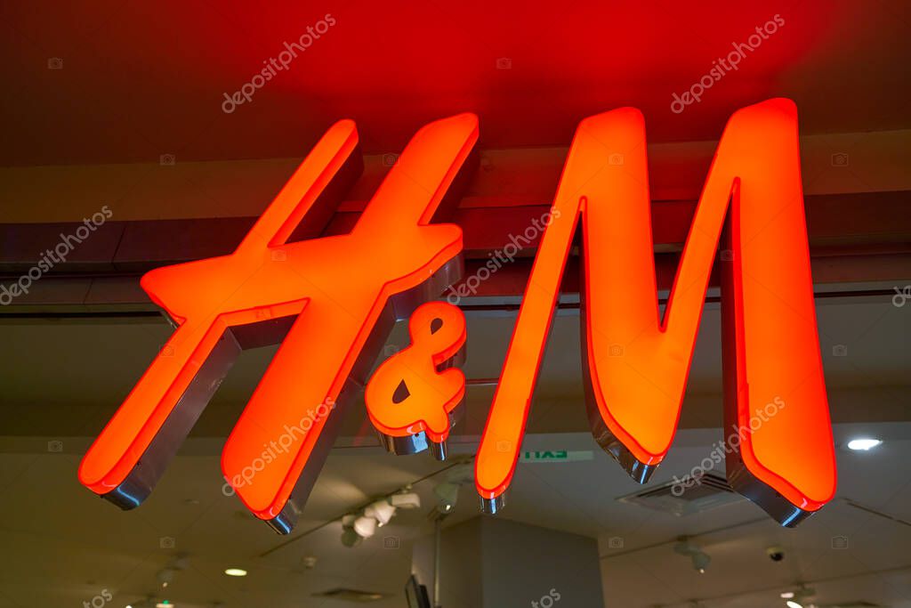 MOSCOW, RUSSIA - CRICA SEPTEMBER, 2018: H&M brand name over entrance to a store in shopping center in Moscow.
