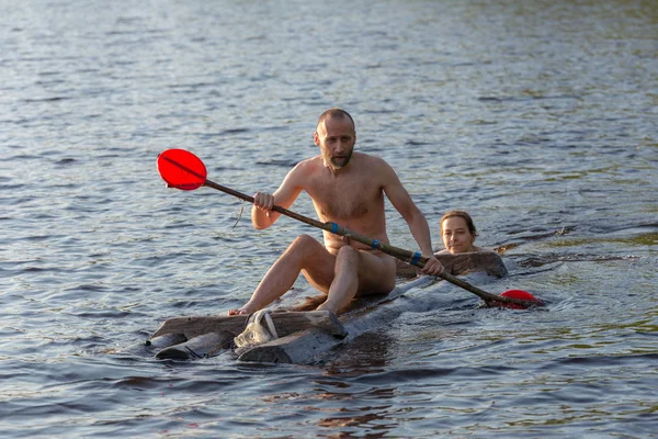 Swimming Woman Pushes Raft Man Lake — Stock Photo, Image