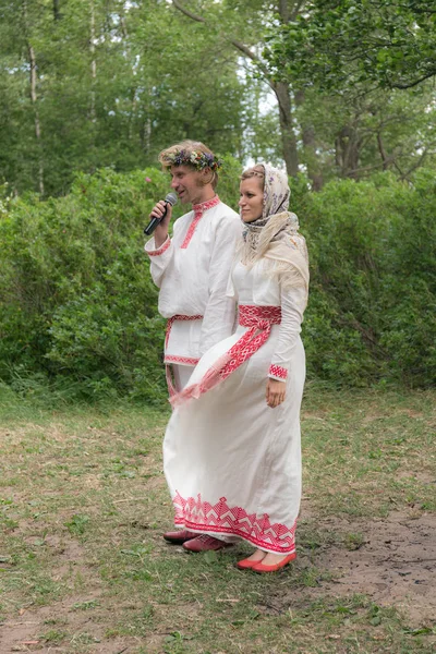 portrait of newlyweds in traditional russian clothes