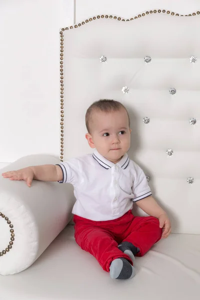 Little boy on the couch — Stock Photo, Image