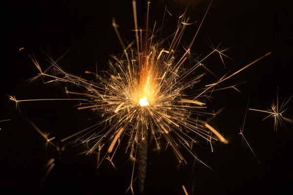 Sparks on black background close up — Stock Photo, Image