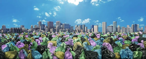 Concept of global pollution. Trash sea on a city skyline background. Save the planet.