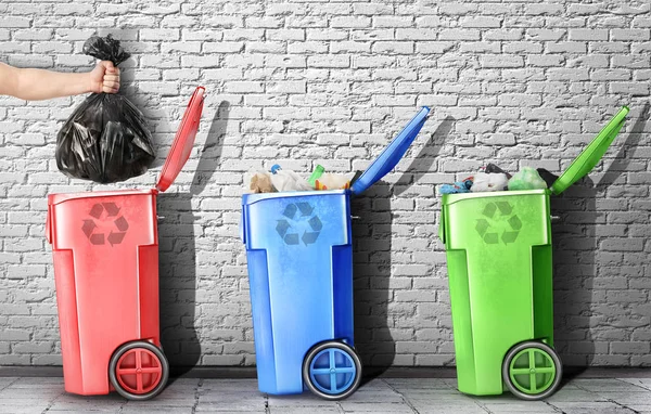 Concept Garbage Recycling Hand Throws Garbage Bag Garbage Boxes Brick — Stock Photo, Image