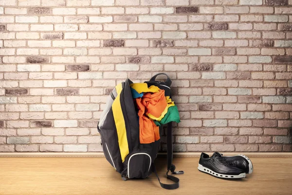 Outdoor Backpack Clothes Brick Wall Background — Stock Photo, Image