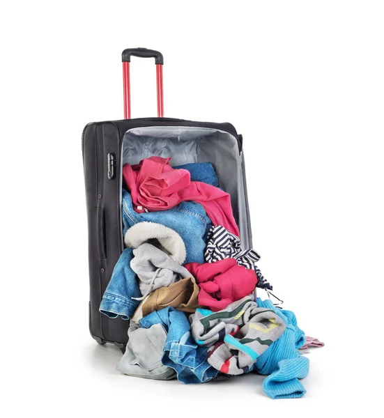 Open suitcase with clothing isolated on a white — Stock Photo, Image