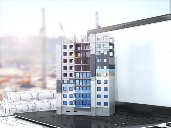 Concept of building a residential building. The layout of the residential building with the facade insulation scheme is located on the laptop. 3d illustration