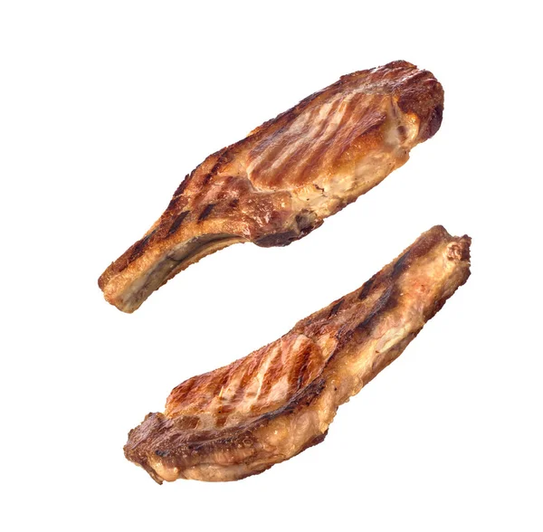 Conjunto de staekes de carne grelhada no osso isolado — Fotografia de Stock