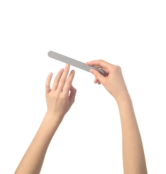 Nail file in womens hands isolated — Stock Photo, Image
