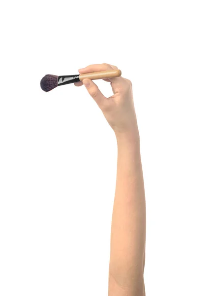 Make up brush in womens hand isolated — Stock Photo, Image