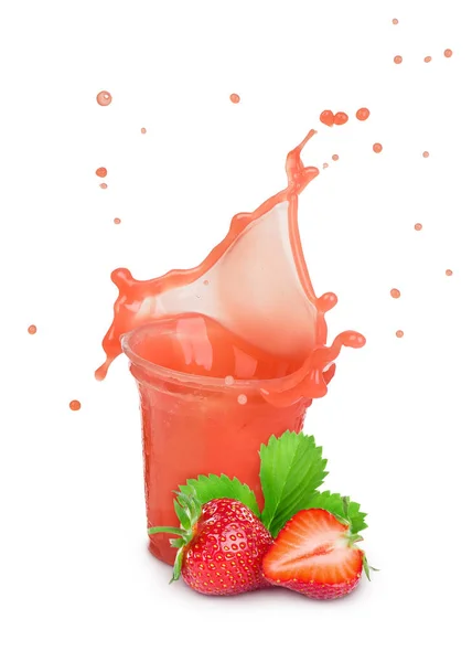 Splash of strawberry juice in a plastic glass with strawberries — Stock Photo, Image