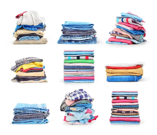 Stacks of folded clothes set isolated on a white background — Stock Photo, Image