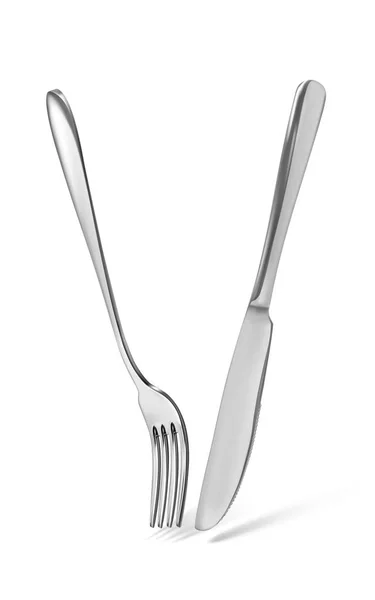 Ilustração vetorial de uma faca de cozinha e garfo — Vetor de Stock