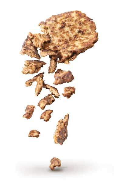 Fried cutlet broken into pieces isolated on a white background — Stock Photo, Image