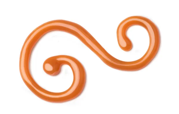 Curl of caramel on a white background — Stock Photo, Image