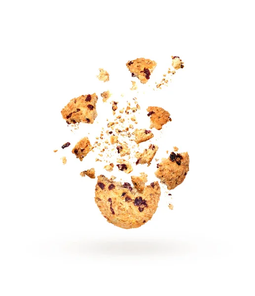 Oatmeal cookies in dynamics on a white background — Stock Photo, Image