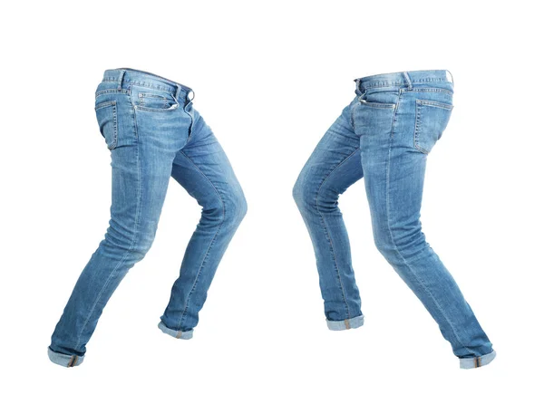 Calça jeans vazia em branco à esquerda e à direita no isolamento em movimento — Fotografia de Stock