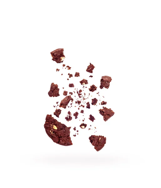 Pieces of chocolate chip cookie on a white background — Stock Photo, Image