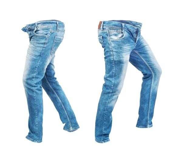 Чистые джинсы брюки слева и справа изолированы на белом пляже — стоковое фото