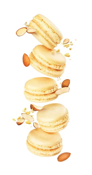 Stack of macaroons fly on a white background with almonds — Stock Photo, Image