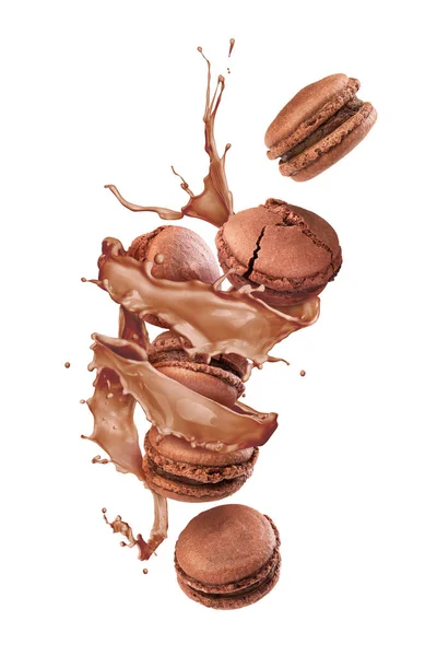Chocolate macaroons fly with a chocolate splash on a white backg — Stock Photo, Image