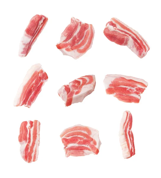 Conjunto de fatias de bacon isoladas em um fundo branco — Fotografia de Stock