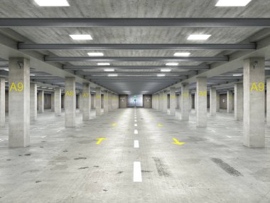 Boş, iyi aydınlatılmış, beton kaplı, büyük bir yeraltı otoparkı.