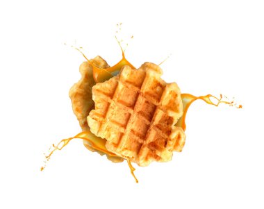 falling two waffles and caramel splash isolated clipart